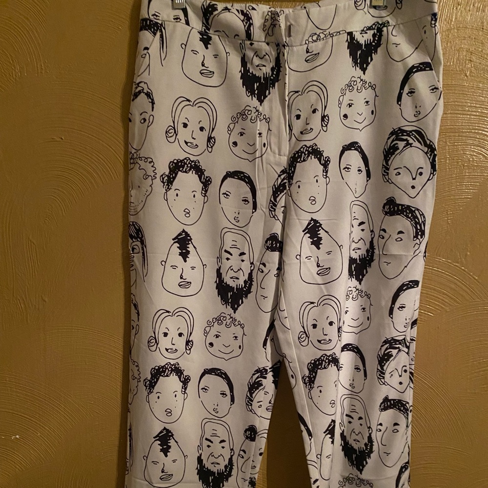 Fun unique white dress pants with faces on it